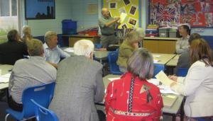 Rtn John Drury explains the Student Interview Assessment Form to interviewers